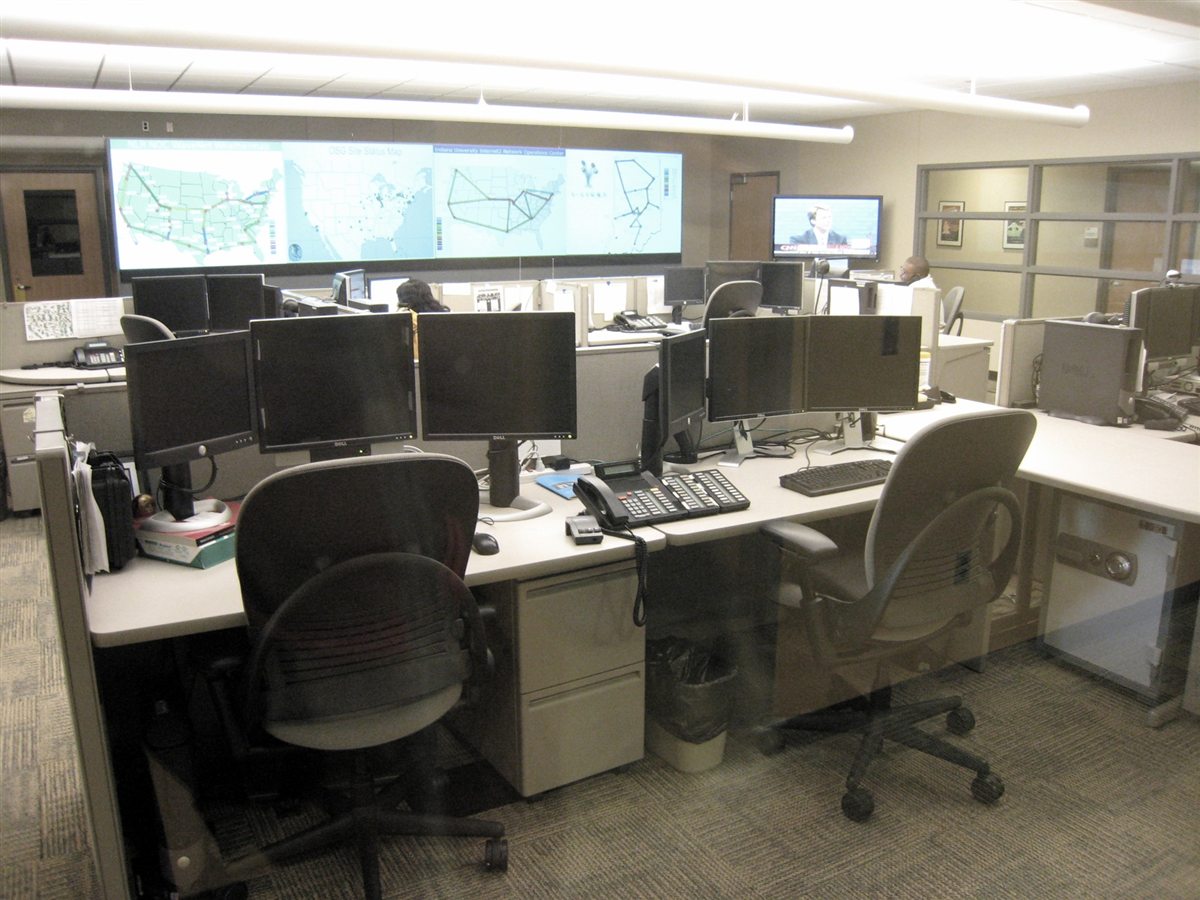 Engineers monitoring a network operations centre